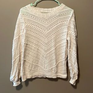 Cream colored rounded neck loft sweater
